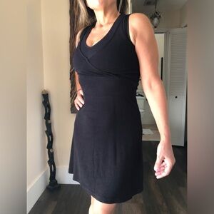 Black short dress. Perfect cleavage